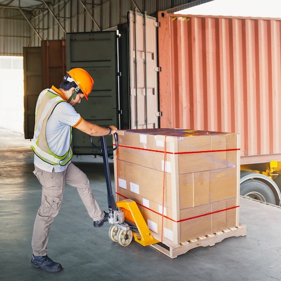 Warehouse,Workers,Loading,A,Package,Pallets,At,Warehouse.,Container,Shipping.